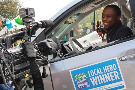 Picture of Antonio Dowels in his new accessible vehicle 