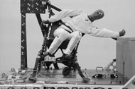 Figure Two shows the post-test side view photos of the dummy and wheelchair&rsquo;s final position after each of the three tests.  In all tests the wheelchair is upright and similar to the pre-test photos.  In all the photos the ATD is leaning to its left with a torso angle of approximately 45 degrees for test A, 100 degrees for test B, and 15 degrees for test C. 