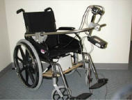 The bottom of Figure 1 shows the camera and laser mounted on a manual wheelchair with the help of a bar attached to the wheelchair&rsquo;s armrests. The camera and laser are centered vertically with a distance between them of 40cm.